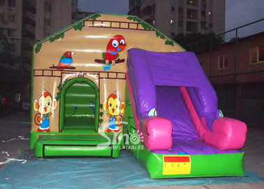 Commercial backyard jungle theme kids inflatable jumping castle with slide made of best pvc tarpaulin